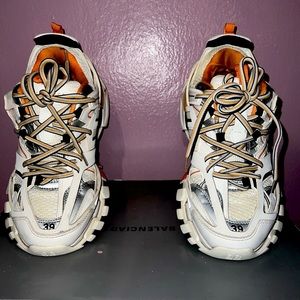 orange cream balenciaga sneakers size 39 but can fit a 40 as well there well
